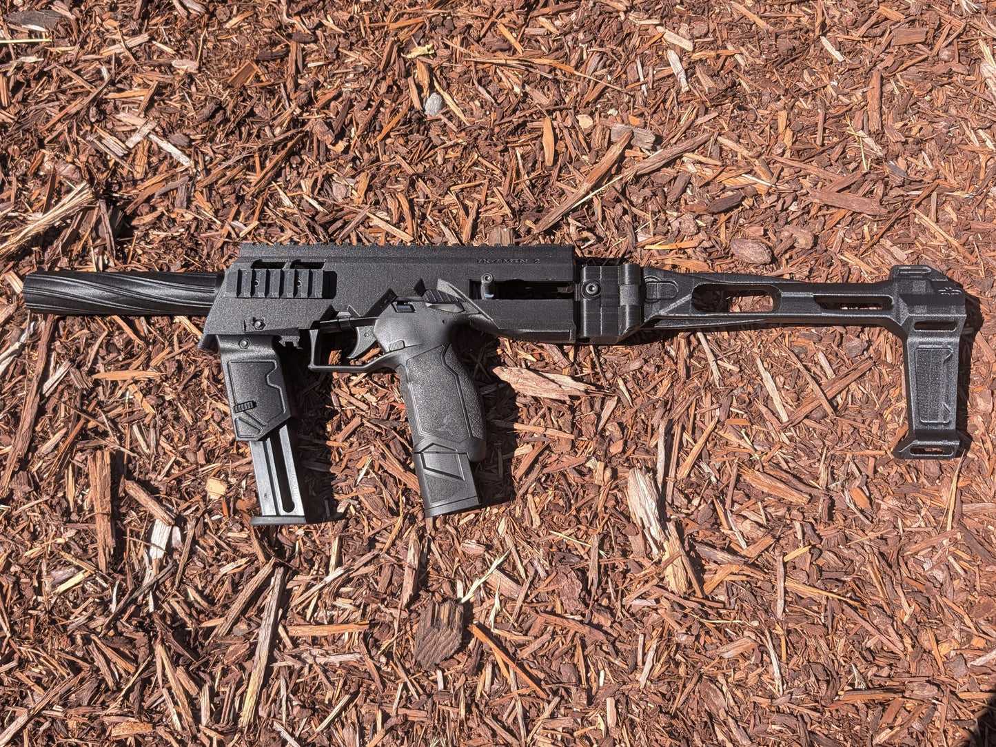 TX22 MTN2 Super Bundle featuring modular chassis, backplate, brace, mag holders, and magazine extensions for enhanced accuracy and control