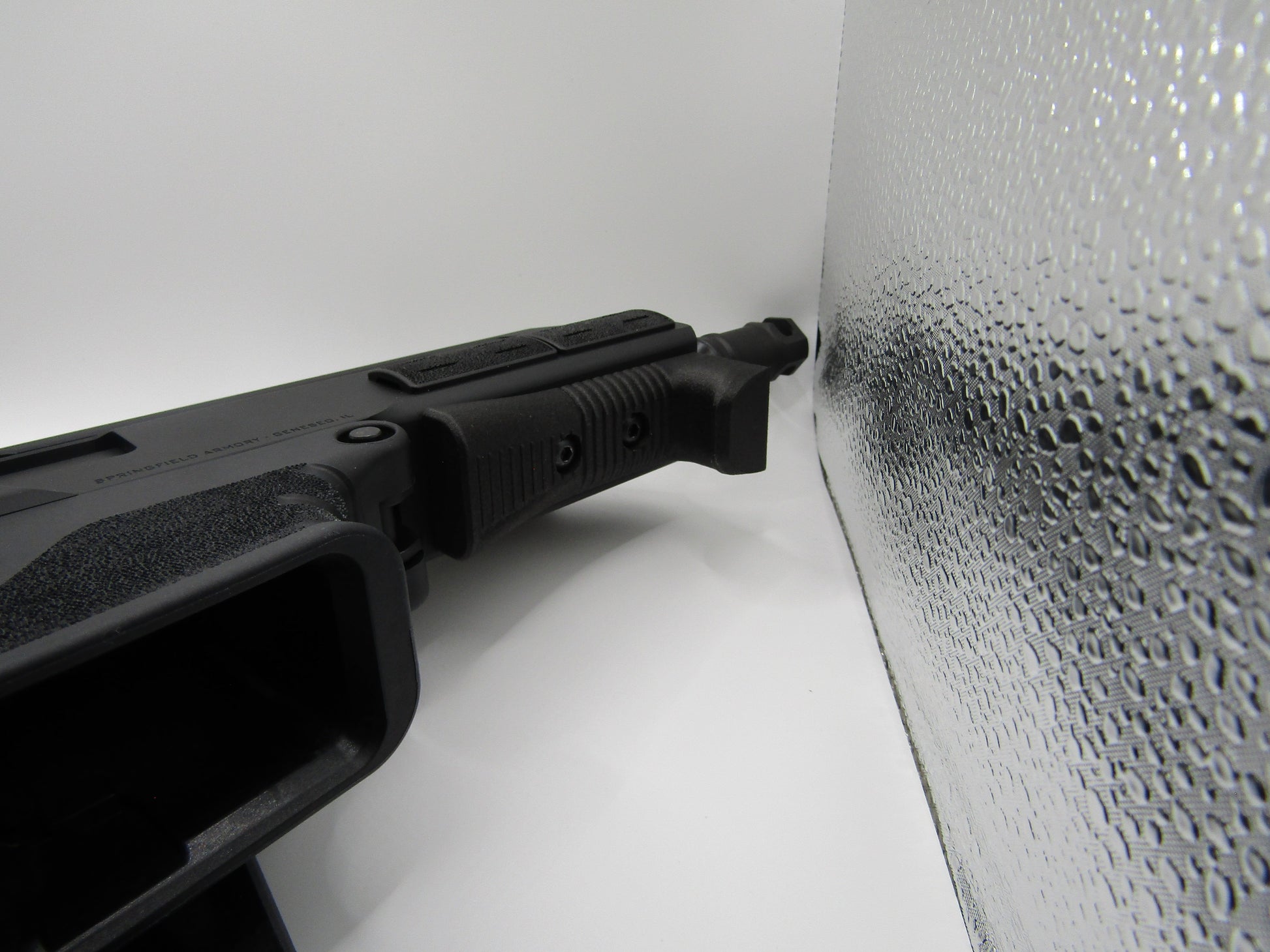 Springfield Kuna angled foregrip handstop mounted on rifle rail for improved control and recoil management